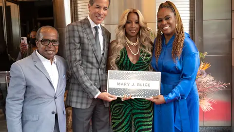 NEW YORK, NEW YORK - MAY 28: Billy Mitchell, Charles Phillips, Mary J Blige and Kamilah Forbes pose with Mary J Blige's plaque at a ceremony for induction into the Apollo Walk of Fame at The Apollo Theater on May 28, 2021 in New York City. (Photo by Shahar Azran/WireImage)