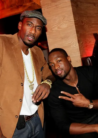 Baller Status - New York Knicks' Amar'e Stoudemire and Miami Heat's Dwyane Wade do the &quot;cool pose&quot; at the VEVO Presents: Music Meets Fashion event featuring Robin Thicke and Belvedere Vodka at The Darby Restaurant in New York City. (Photo:&nbsp; Marc Andrew Deley/Getty Images)