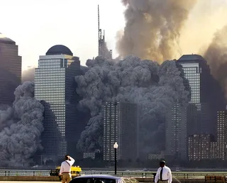 The Second Collapse - 10:28 The North Tower of the World Trade Center begins to collapse. (Photo: Ray Stubblebine / Reuters)