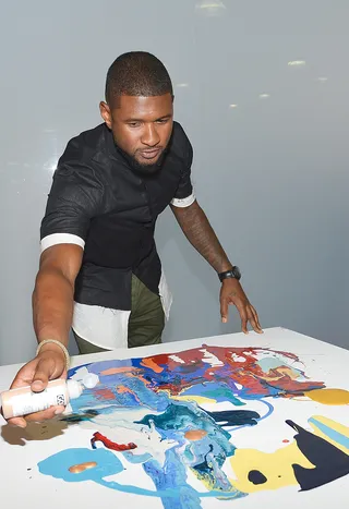 He's Crafty - Usher does some painting at the launch event for his collaboration with kids stationary and office supply brand Yoobi at Siren Studios in Hollywood. (Photo: Charley Gallay/Getty Images for Yoobi)