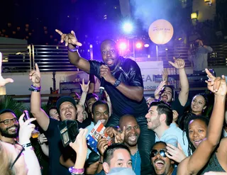 Vegas, Baby! - Wyclef Jean performs amongst the crowd at Metro PCS/ PANDORA day party at The Boulevard Pool at The Cosmopolitan of Las Vegas.(Photo: Bryan Steffy/Getty Images for PANDORA Media)