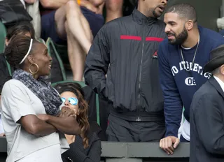 All Love - Drake talks to Venus Williams in the players box on Centre Court during Serena Williams quarter-finals victory match against Victoria Azarenka on day eight of the Wimbledon Tennis Championships in London. &nbsp;(Photo:i-Images, PacificCoastNews)