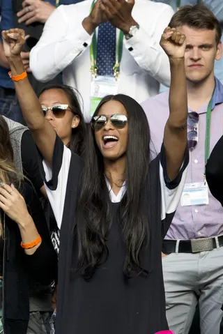 Love - Ciara cheers for her friend Serena Williams as she battles past Victoria Azarenka into the quarter-finals on day eight of the Wimbledon Tennis Championships in London.(Photo: i-Images, PacificCoastNews)