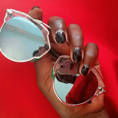 Lupita Nyong’o - Sexy shades and a sequin-kissed mani to match? Somebody’s doing summer right.(Photo: Lupita Nyongo via Instagram)