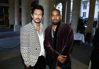 Great Minds - Fashion designer Haider Ackermann and Kanye West chat it up inside the mytheresa.com and Haider Ackermann Dinner at Le Grand Vefour during Paris Fashion Week Haute Couture Fall/Winter 2015/2016.(Photo: Julien Hekimian/Getty Images)