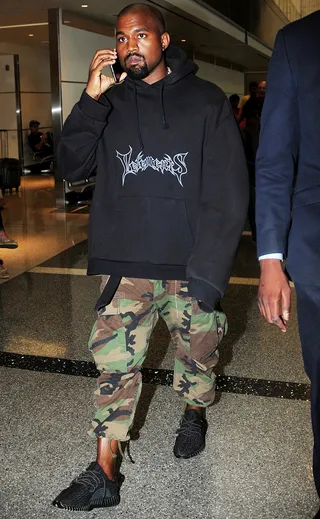 Peace Out - Kanye West&nbsp;is on the move again departing from Los Angeles International Airport.  (Photo: Splash News)