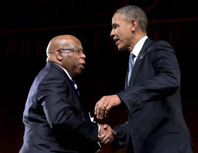 He'll Show You Change - &quot;Without the leadership of President Lyndon Johnson and involvement of hundreds and thousands and millions of people in the civil rights movement, there would be no President Jimmy Carter, no President Bill Clinton, no President Barack Obama,&quot; said civil rights icon Rep. John Lewis, introducing Obama at the LBJ summit. &quot;When people say nothing has changed, I say, 'Come and walk in my shoes and I will show you change.' &quot;  (Photo: AP Photo/Carolyn Kaster)