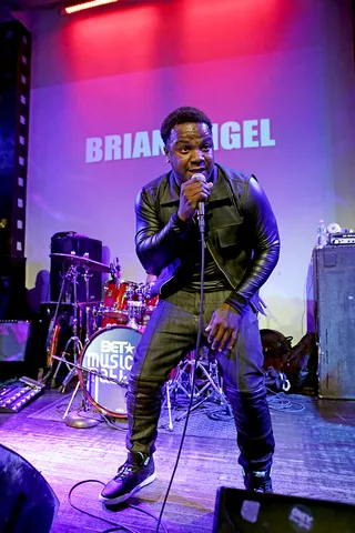 Get Low - Singer Brian Angel digs deep to hit his notes during his performance.(Photo: Bennett Raglin/BET/Getty Images for BET)