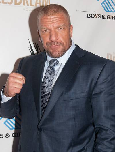 Triple H @TripleH - Tweet: &quot;Saddened to announce the passing of the Ultimate Warrior. Icon and friend. My sympathy to his wife Dana and his daughters&quot; (Photo: Erika Goldring/Getty Images)