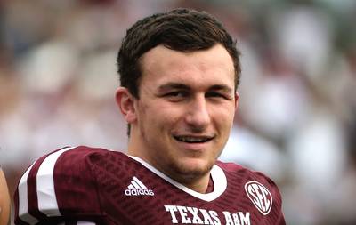 Manziel's Texas A&amp;M Jersey Expected to Reach $100K Bid - SCP Auctions believes its autographed Johnny Manziel Texas A&amp;M jersey will fetch a winning bid of about $100,000, according to ESPN. SCP says Manziel wore the jersey for all his home games during his 2012 Heisman-winning season.&nbsp;(Photo: Scott Halleran/Getty Images)
