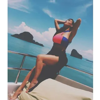 Kim Kardashian @kimkardashian - &quot;Wish you were here&quot;So do we! Kim Kardashian stunned in colorful swimwear on a yacht in Thailand.(Photo: Kim Kardashian via Instagram)
