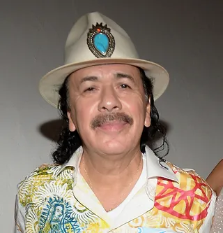 Carlos Santana: July 20 - The iconic Mexican-American guitarist and vocalist continues to serenade crowds at 67. &nbsp;&nbsp;(Photo: Gustavo Caballero/Getty Images for HBO)