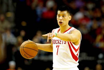 Rockets Diss Lin With No. 7 Melo Image - The Houston Rockets reportedly showed Carmelo Anthony pictures of himself in a No. 7 Rockets jersey during their meeting Wednesday. Cool idea, nice gesture. One problem, though: Rockets point guard Jeremy Lin&nbsp;already sports No. 7. The gesture could spell the Rockets' willingness to trade Lin, prompting the fourth-year guard to tweet a bible verse: &quot;Luke 6:29 - If someone slaps you on one cheek, turn to them the other also. If someone takes your coat, do not withhold your shirt from them.&quot; Melo and Lin are no strangers, having been former teammates on the New York Knicks. In 2012, when the Rockets offered Lin a three-year, $25 million offer, Melo called it a &quot;ridiculous contract.&quot;&nbsp;&nbsp;(Photo: Scott Halleran/Getty Images)