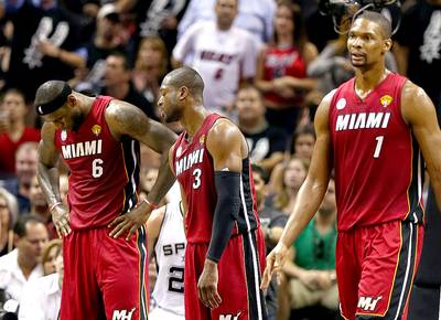 Pay Cuts for Dwyane Wade, Chris Bosh? - ESPN reports that all signs lead to the Miami Heat keeping its Big Three. But will they be able to keep them happy? With the Heat expected to meet LeBron James’s demands for a maximum salary of just over $20 million, Dwyane Wade and Chris Bosh will most likely have to take substantial pay cuts. That being said, Henry Thomas, agent of both Bosh and Wade, already called reports of them taking as low as $12 million and $11 million, respectively, next season “BS.” CBS Sports also points out that if Bosh and Wade take salaries in the combined $30 million range, the Heat would have to use roughly $9 million to fill out seven roster spots after owing Norris Cole his guaranteed money and awarding point guard Shabazz Napier with a rookie contract. The Heat are also reportedly interested in Toronto Raptors’ guard Kyle Lowry, Cleveland Cavaliers small ...