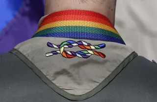 Boy's Scout Pride - A Boy Scout wears a rainbow-colored knot on his kerchief at Salt Lake City's gay pride parade. This is the first time residents have marched since Utah overtunred the state's gay marriage ban in December. It is still awaiting a decision from the federal appeals court.&nbsp;(Photo: AP Photo/Rick Bowmer, File)