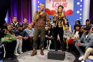 Check This Out - Terrence J watches as Rocsi Diaz demonstrates how Lil Niqo conducted his Grammy interviews for BET, at 106 &amp; Park, February 15, 2012. (Photo: John Ricard / BET)