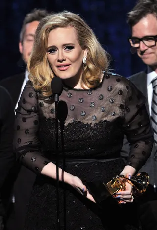 Adele - The night belonged to Adele as she hit the stage again to collect hardware for Record of the Year. (Photo: Kevin Winter/Getty Images)