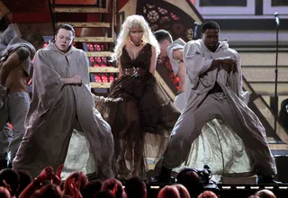 All Eyes on Roman – February 12, 2012 - Darling Nicki shocked many with her red carpet companion (a priest) and Grammy performance. Debuting her track “Roman Holiday” from the latest installment of the Pink Friday series, Pink Friday: Roman Reloaded, the over-the-top showing sent the Internet into a frenzy.