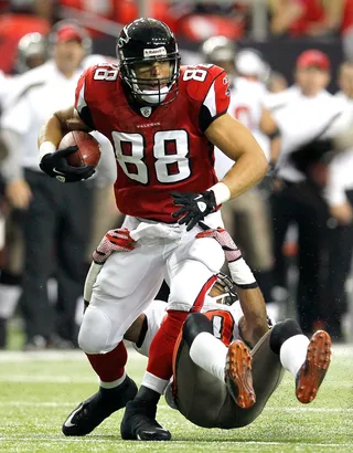 Tony Gonzalez to Atlanta - Tight end Tony Gonzalez was acquired by the Falcons from the Chiefs in 2010 as the Falcons attempted to get another chance at the playoffs. In his first game he became the 21st player in NFL history to reach 11,000 receiving yards in his career.(Photo: Kevin C. Cox/Getty Images)