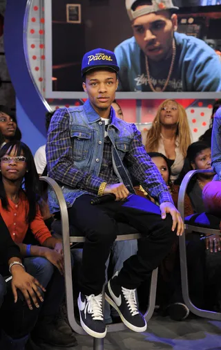 Salute - Bow Wow listens as a video salute to him from Chris Brown plays at 106 &amp; Park, January 23, 2012. (Photo: John Ricard / BET)