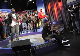 Let's See - Terrence J tells the audience to sit tight and hold on to find out who has won the battle of Relly vs Dolo Chillin at 106 &amp; Park, January 20, 2012. (Photo: John Ricard / BET)