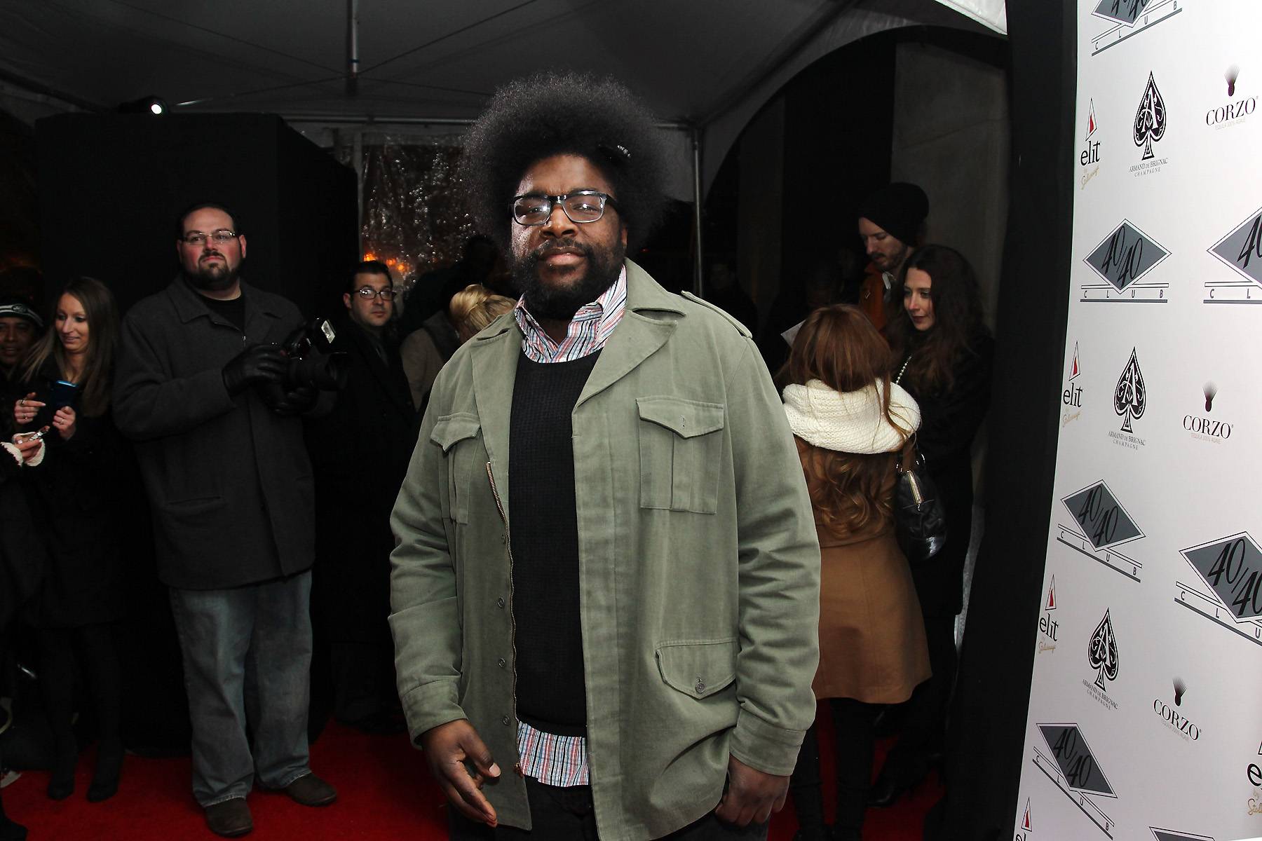 Questlove  - The Roots drummer arrived in a preppy sweater and button-up combo and spectacles. He Tweeted hilarious updates while waiting in a long line to recover his coat at the end of the night, including, “Ok, I think I'm watching the Real Housewives of 40/40's coat check room. 6 chicks bout to take earrings off and apply Vaseline &amp; throw down.” Yikes!   (Photo: Neilson Barnard/Getty Images)