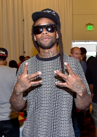 Just Blasé  - "Or Nah" singer&nbsp;Ty Dolla Sign posted up and posing up for a picture. (Photo: Alberto Rodriguez/BET/Getty Images for BET)
