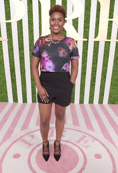 Not-So Awkward Black Girl - Awkward Black Girl's Issa Rae matched her cute flowery top with high-waisted shorts as she strolled down the pink carpet at the pre-dinner event hosted by Debra Lee at the Sunset Tower Hotel. (Photo: Jason Kempin/BET/Getty Images for BET)