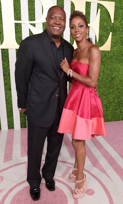 Cute Couple Award Goes To... - Sportscaster Rodney Peete cuddles up with wife and actress Holly Robinson Peete for a cute picture. (Photo: Jason Kempin/BET/Getty Images for BET)
