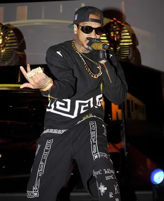 'Down for a Min' - Tyga has a lil' fun with Auto-Tune as he flips the word play to honor his ride or die chick...his Glock.&nbsp;(Photo: Awais Butt/Splash News)