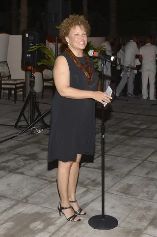 Welcome to Havana - BET Networks Chairman and CEO Debra L. Lee took a break from the dance floor to welcome guests to the Cuban-themed bash. She looked chic in a silky black sheath and studded sandals.(Photo: Gustavo Caballero/Getty Images for BET)