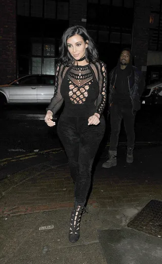 Kim Kardashian - Kimmy is caught leaving a&nbsp;Yeezy&nbsp;recording session at 4 a.m. flaunting major curves in a fitted&nbsp;Julien Macdonald&nbsp;jumpsuit with mesh detailing. She finishes her look with&nbsp;suede Alaïa cut-out boots.(Photo: Squirrel/Splash News)