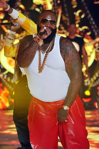 Bawse Up - Rick Ross bossed up in his white muscle shirt and his dope red leather pants!  (Photo: Theo Wargo/Getty Images for BET's Rip the Runway)