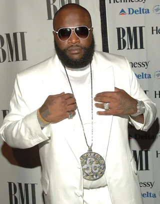 Rick Ross - You can never go wrong with a all white suit with some fly white Gucci shades to match. Rick Ross' suit game has been tight for years.The Def Jam MC definitely reps well for all big men.&nbsp;(Photo: William D. Bird/Getty Images)