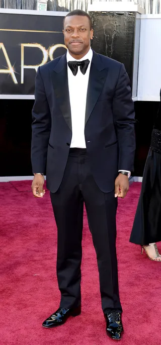 Chris Tucker - Comedian and actor Chris Tucker hit the carpet looking clean in his look. We love the navy color and oversized bow tie. (Photo: Jason Merritt/Getty Images)