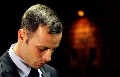 Pistorious Charged With Premeditated Murder - South African runner Oscar Pistorious was charged with premeditated murder for the shooting death of his girlfriend, Reeva Steenkamp, despite his claims that he thought she was a burglar. &nbsp;  (Photo: Themba Hadebe/AP Photo)