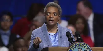 Mayor Lori Lightfoot (Full Getty Caption: Lori Lightfoot Is Sworn In As Chicago's First Female African American Mayor CHICAGO, ILLINOIS - MAY 20: Lori Lightfoot addresses guests after being sworn in as Mayor of Chicago during a ceremony at the Wintrust Arena on May 20, 2019 in Chicago, Illinois. Lightfoot become the first black female and openly gay Mayor in the city’s history. (Photo by Scott Olson/Getty Images)