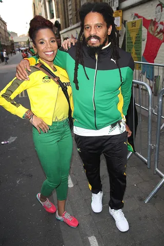 Black, Green and Gold - Siblings Cedella and Rohan Marley pose outside Puma Yard to watch Jamaican track star Usain Bolt take the gold in men's 200m on day 13 of the 2012 London Olympic games in London.&nbsp;   (Photo: WENN.com)