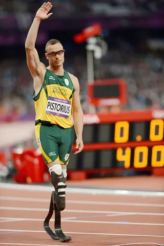 First Double Amputee to Compete in the Olympic and Paralympic Games - Athlete: Oscar Pistorius Country: South Africa Date: Aug. 4 Factoid:&nbsp;&nbsp;Pistorius ran the first heat of the first round of the men's 400m race.  (Photo: Julia Vynokurova/Getty Images)