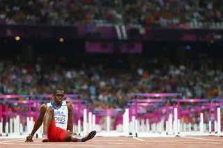 Cuba's Robles Is Down and Out - Dayron Robles of Cuba was forced out of the men's 110m hurdles final after an injury ended his bid for a medal. (Photo: Michael Steele/Getty Images)