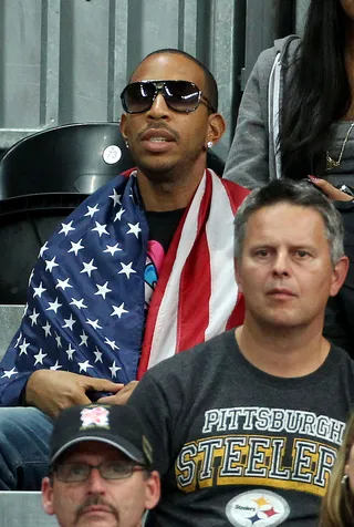 Cloaked in Stars...and Stripes - Rapper and actor Christopher &quot;Ludacris&quot; Bridges was spotted rocking the American flag while in the stands watching the Olympic Basketball match between Team USA and Argentina at the London Olympics 2012.  (Photo: Jean Catuffe, PacificCoastNews.com)