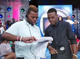What was That - Luke James reviews the scrip with producer Anthony at 106 &amp; Park, August 7, 2012. (Photo: John Ricard / BET)