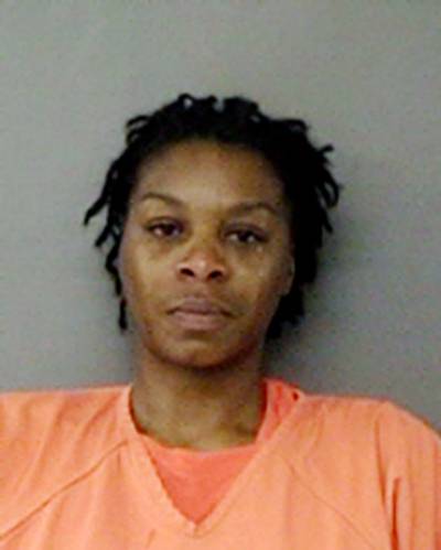 Twitter: Was Bland Alive in Her Mugshot? - Amid the inconsistent information provided by the Waller County police, some are speculating whether Bland was alive while she was taking her mugshot. Some tweeted that it appears that Bland is lying down on the ground while the photo is being taken.  (Waller County Sheriff?s Office, via AP)
