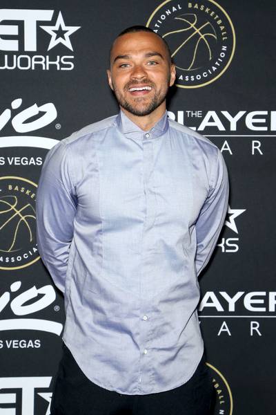 50 Shades of Grey   - Jesse Williams of Grey's Anatomy is in good spirits before he takes the stage to present for The Players' Awards. (Photo: Gabe Ginsberg/BET/Getty Images for BET)