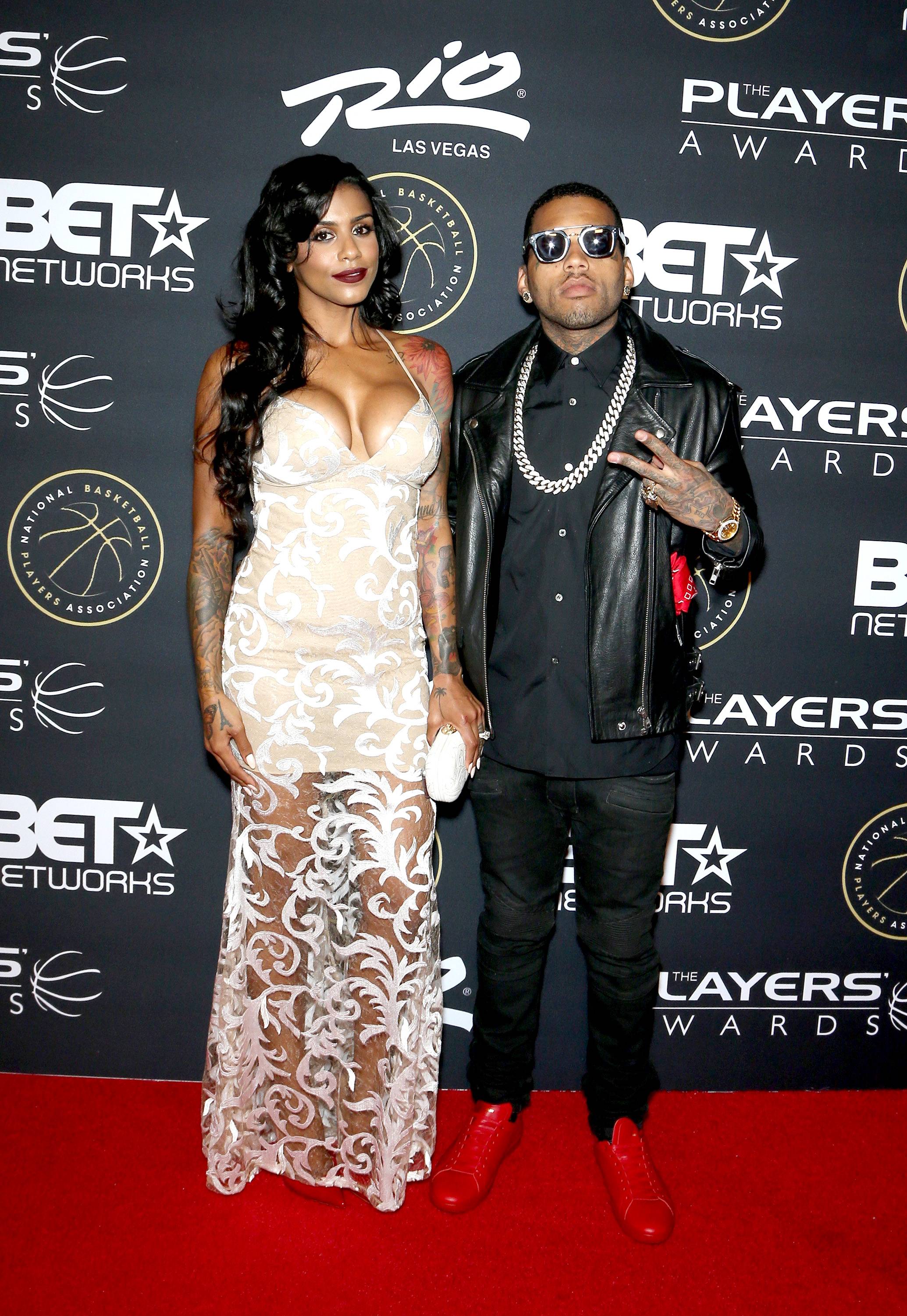 Body Language  - Kid Ink and his fiancée,&nbsp;Asiah Azante, make a grand appearance. Dressed to the nines, these two are killing the game. (Photo: Bryan Steffy/BET/Getty Images)