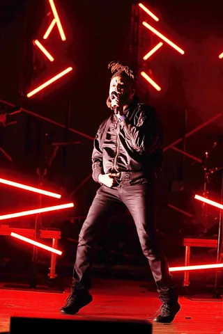 The Weeknd - The Weeknd closed out last night's show and had the crowd mesmerized as he performed some of his hits including &quot;Can't Feel My Face&quot; and &quot;The Hills&quot; and covered Beyoncé's &quot;Drunk In Love.&quot;&nbsp;(Photo: John Lamparski/WireImage)