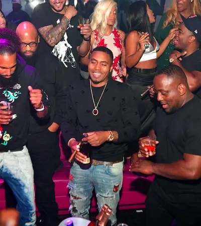 Legend - Nas is all smiles as he opens a bottle of Hennessy V.S.O.P Privilege at Goldroom Nightclub in Atlanta.(Photo: Prince Williams / ATLpics.net)