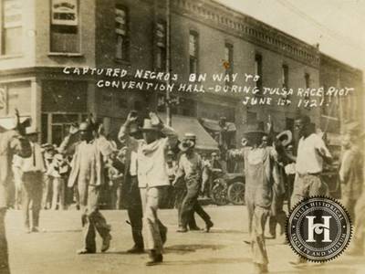 Under Siege - A postcard shows Black Tulsans being marched to the city's convention Hall during the 1921 Tulsa Race Massacre.&nbsp;