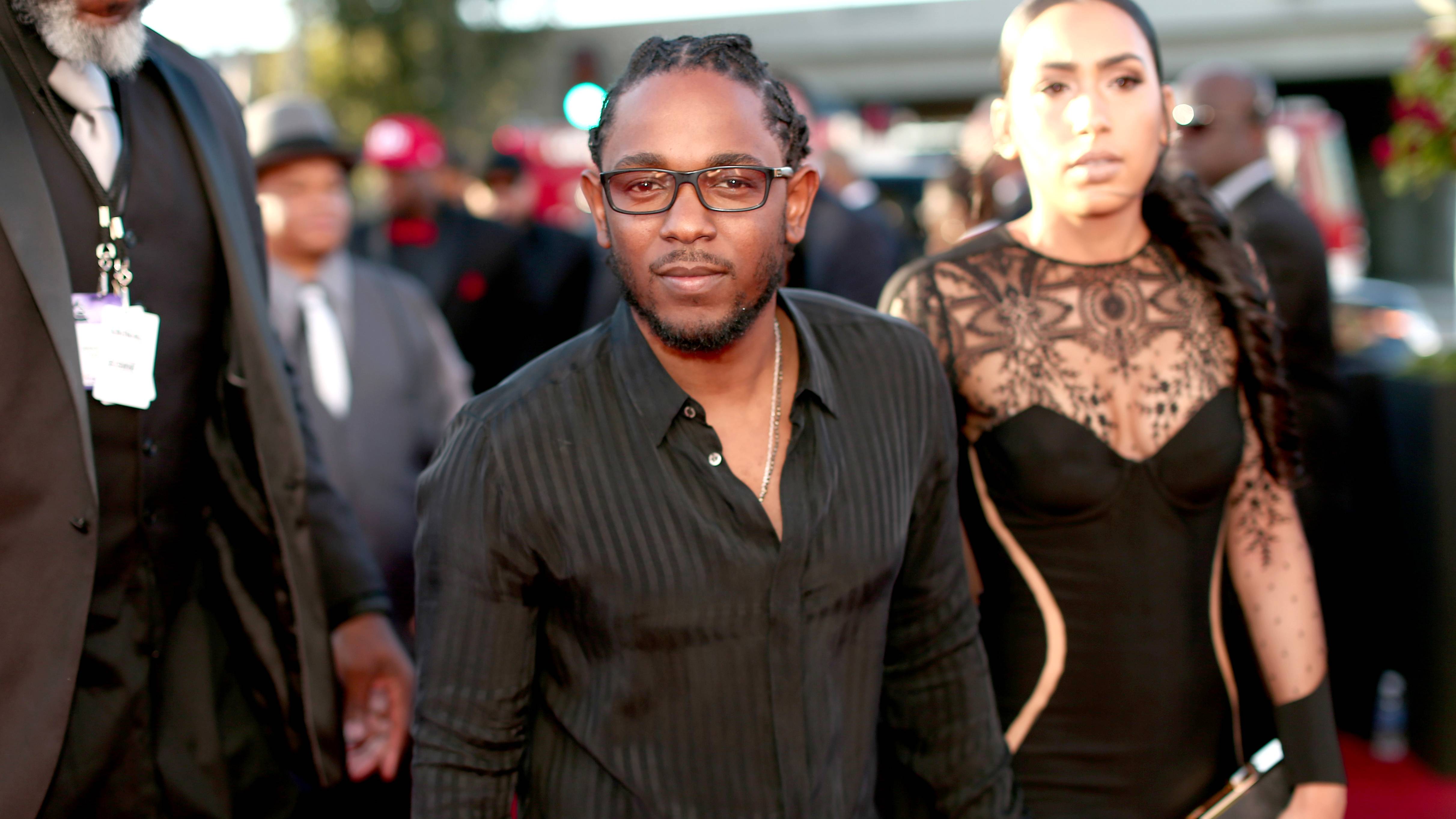 LOS ANGELES, CA - FEBRUARY 15:  Rapper Kendrick Lamar (C) and Whitney Alford attend The 58th GRAMMY Awards at Staples Center on February 15, 2016 in Los Angeles, California.  (Photo by Christopher Polk/Getty Images for NARAS)