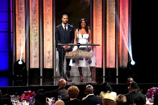 Opportunity Awaits&nbsp; - Actors Omari Hardwick and Nia Long thank ABFF Founder/CEO Jeff Friday for his contributions. (Photo: Alberto Rodriguez/BET/Getty Images for BET)